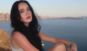 Fiona Frills Image Sitting on Beach